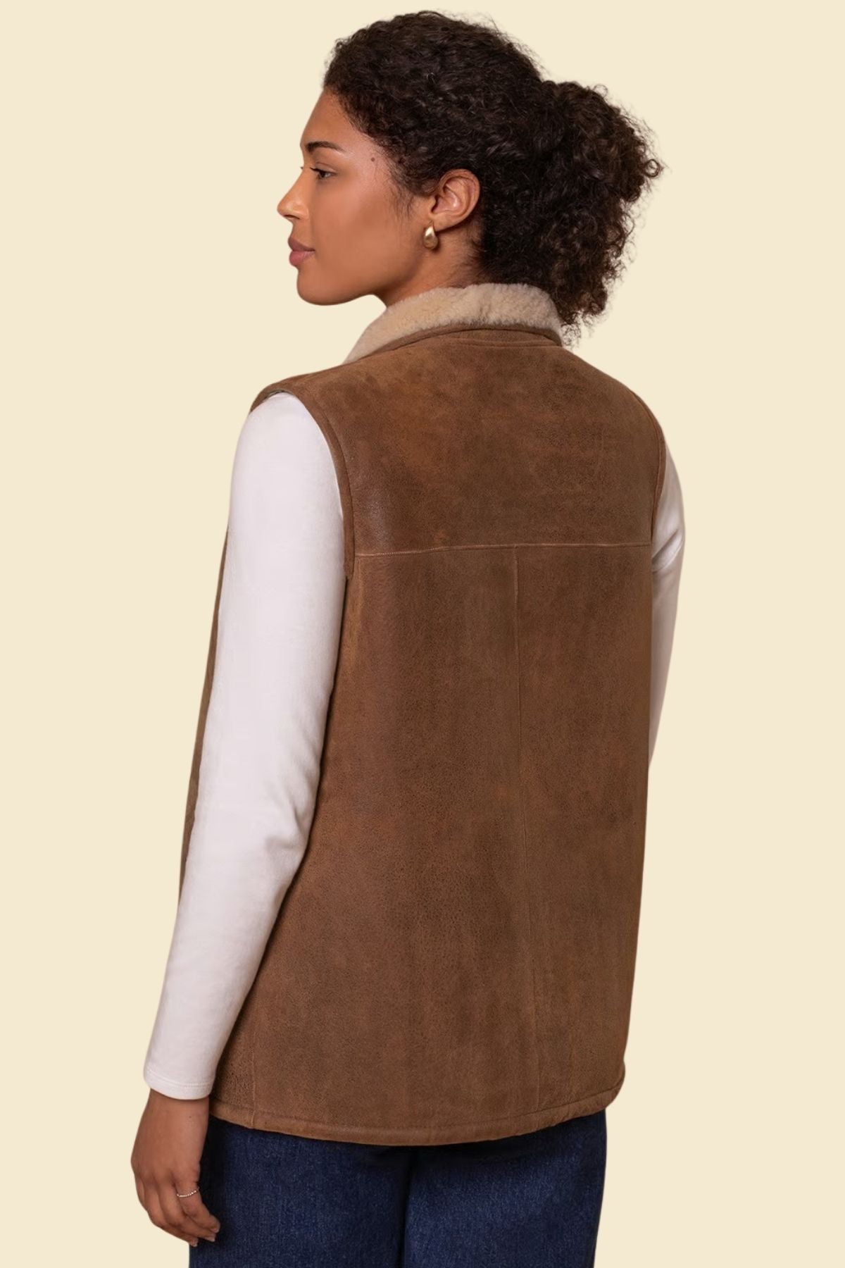 Vintage-inspired sheepskin leather vest with flight-style collar and soft lining.