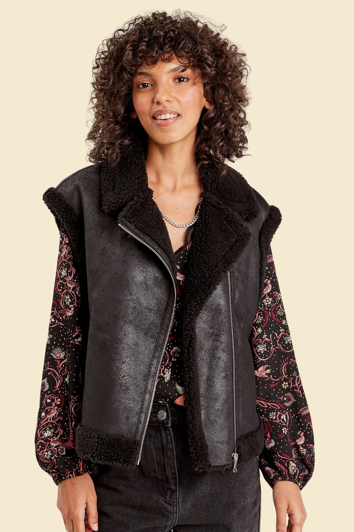 vintage-style black leather aviator vest for women.
