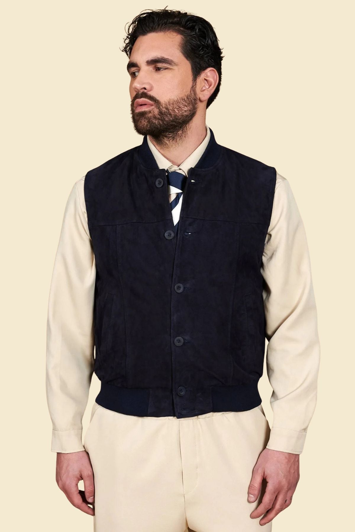 men’s black suede vest featuring a classic Western cut and pointed yoke detail.