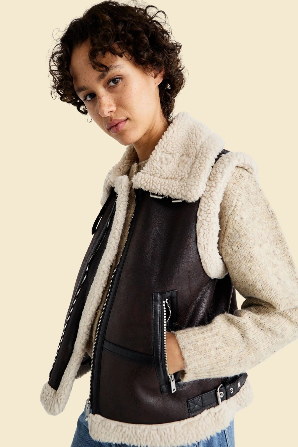 Classic shearling vest with rich distressed brown leather outer and warm inner lining.