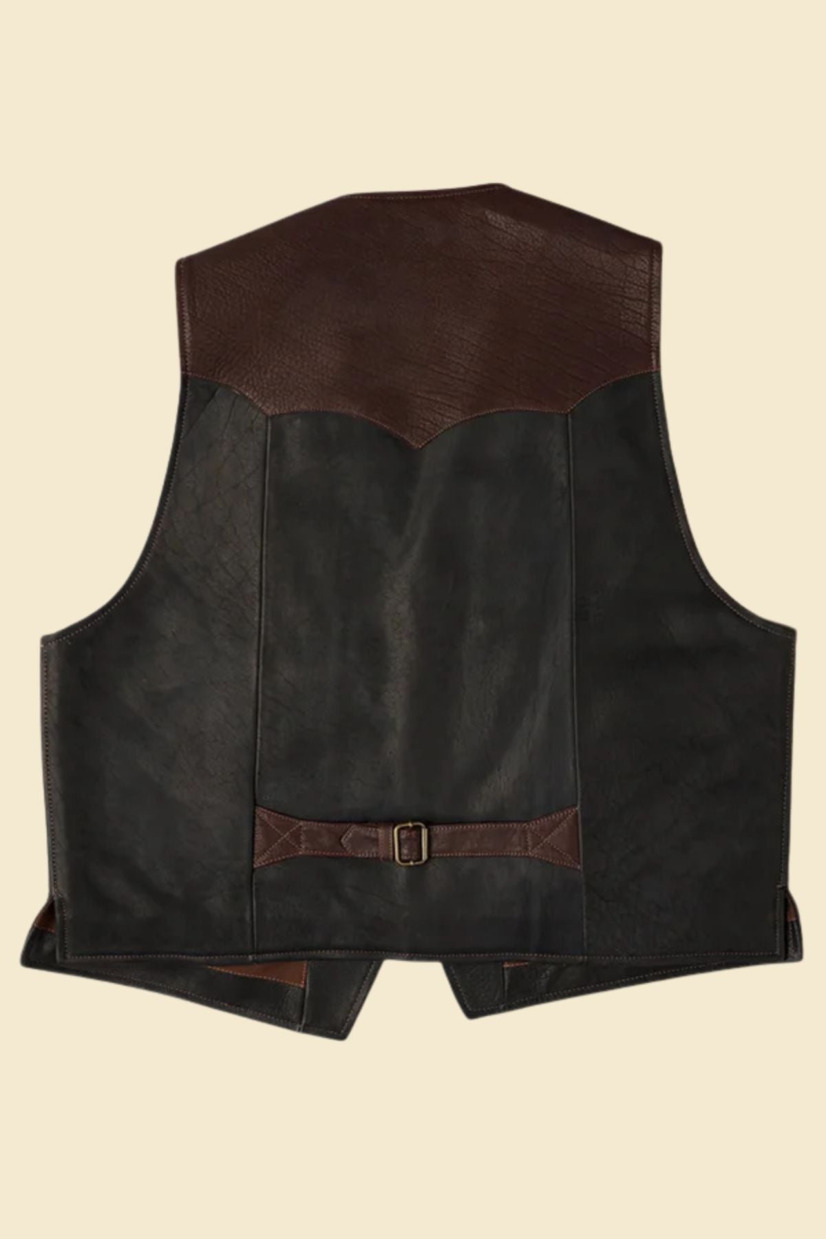 leather texture and Western yoke stitching on brown sheepskin vest.