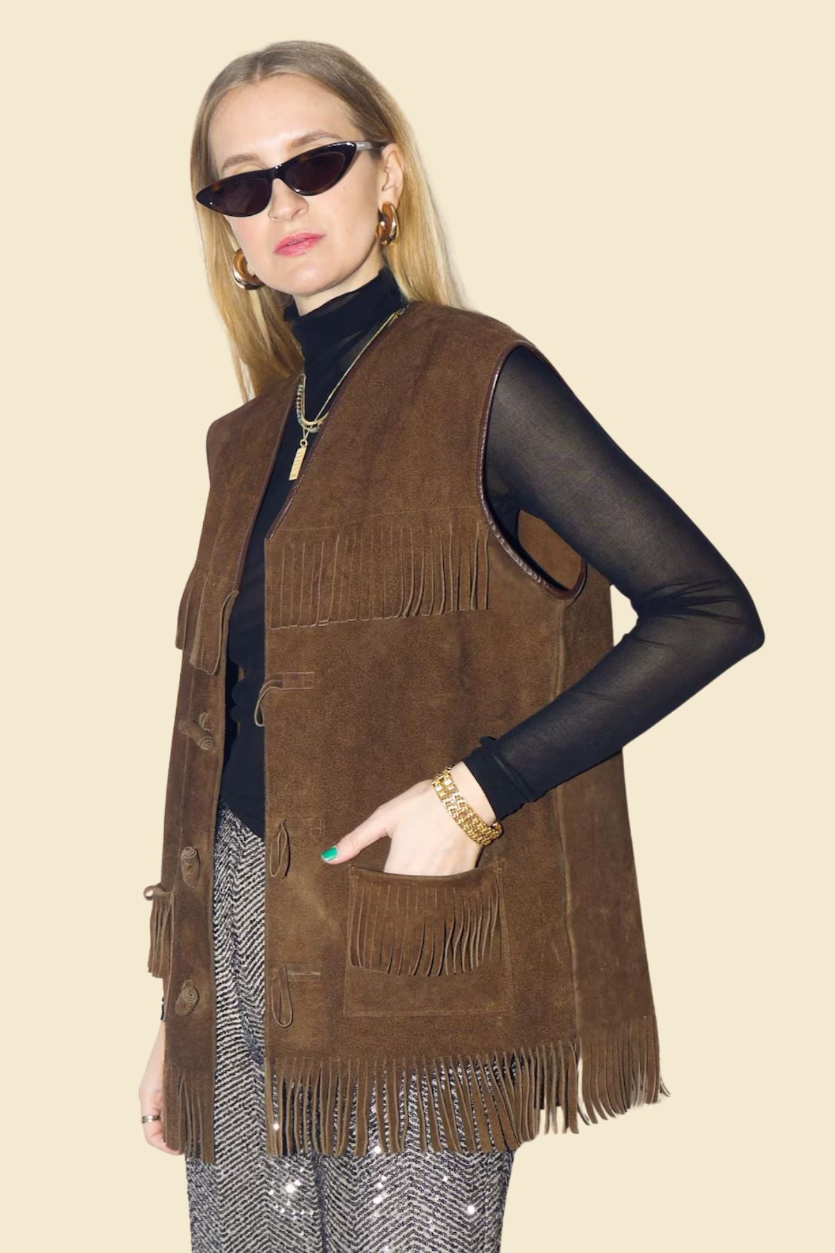 women’s cowgirl-inspired brown suede fringe vest.