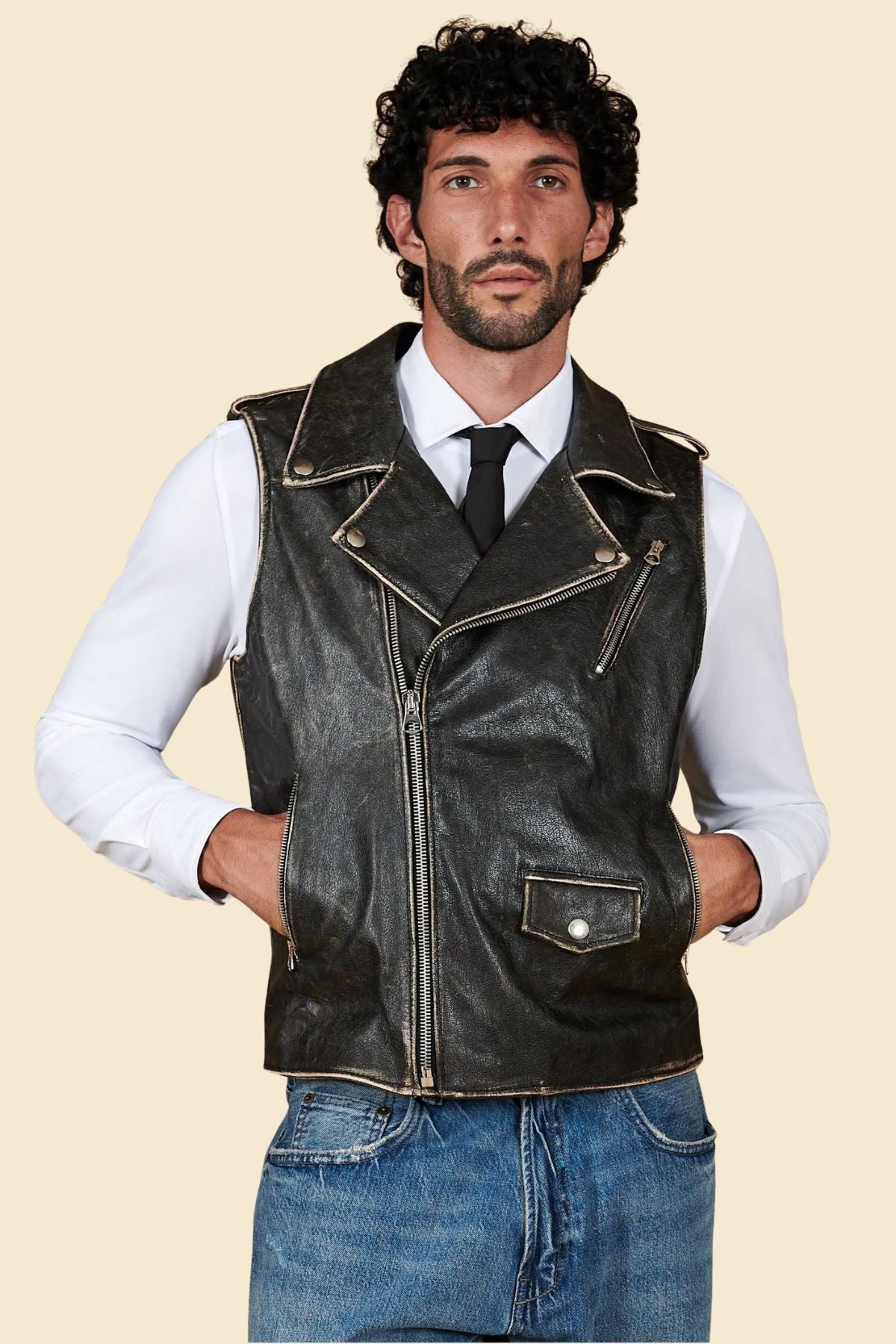 cowhide leather texture and strong stitching on men’s motorcycle vest.