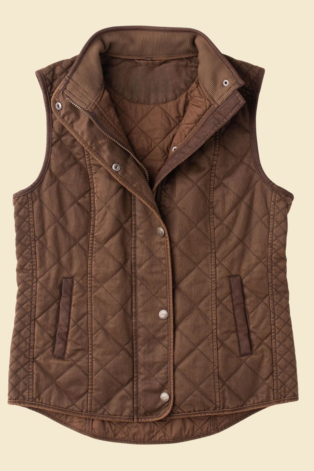 Close-up of quilted lambskin leather pattern in brown vest