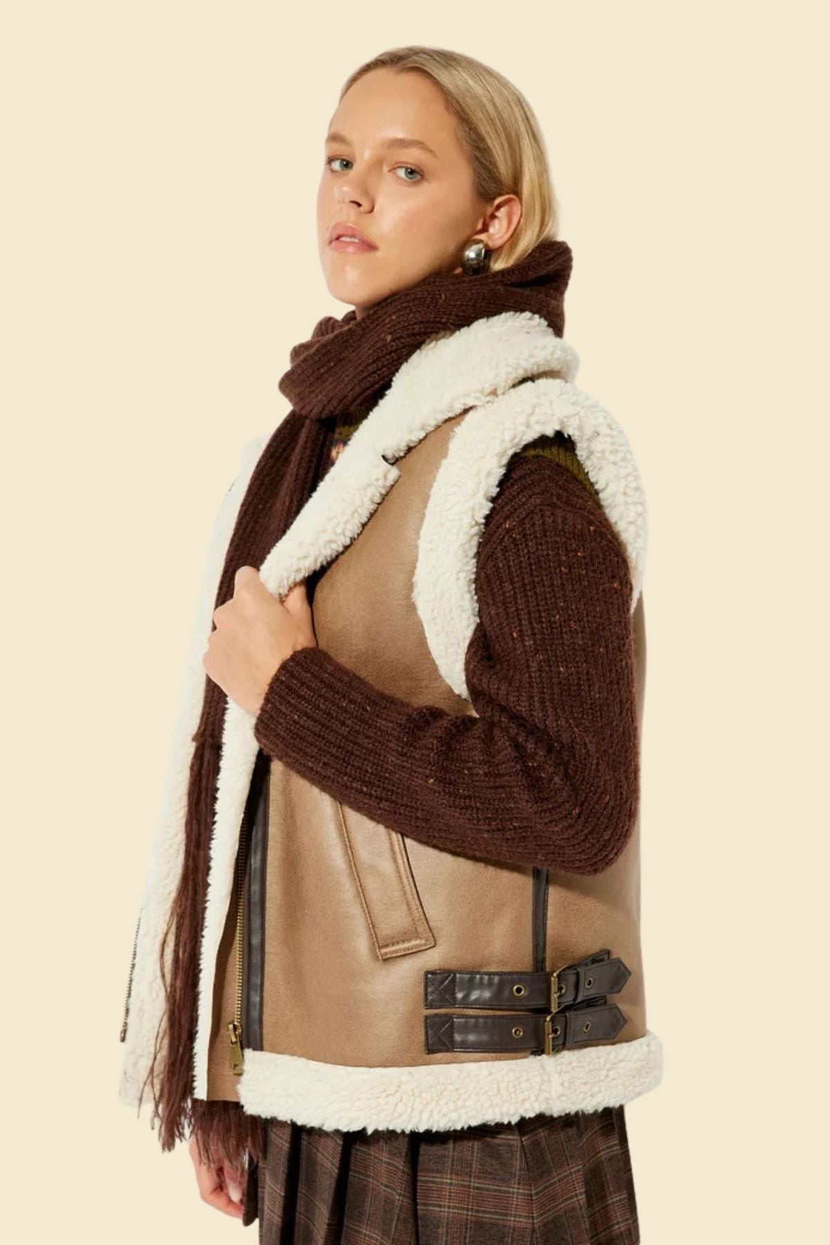 Chic faux fur and leather vest for women, perfect for cool weather.