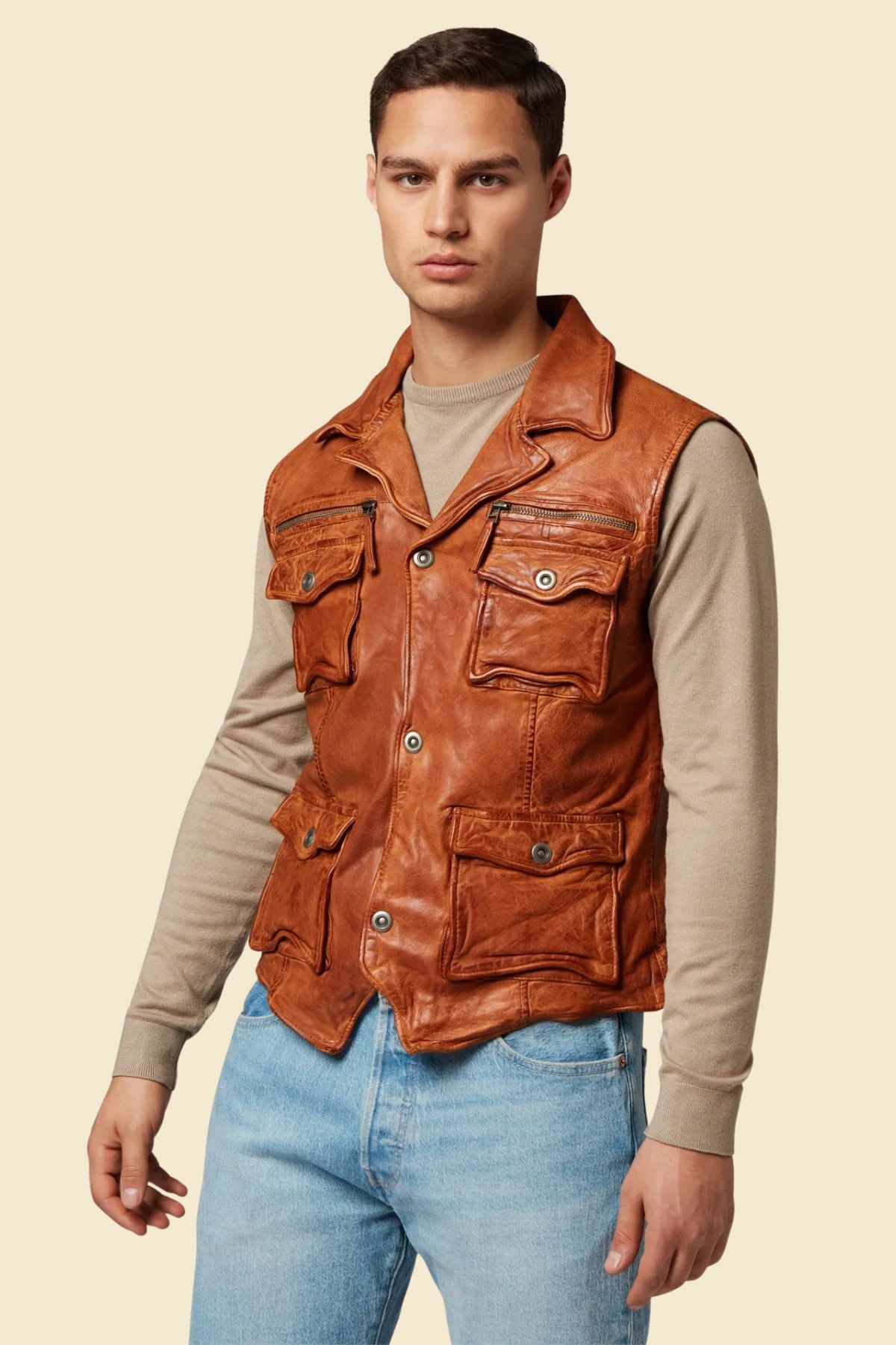 leather biker vest for men showing durable stitching and storage pockets.