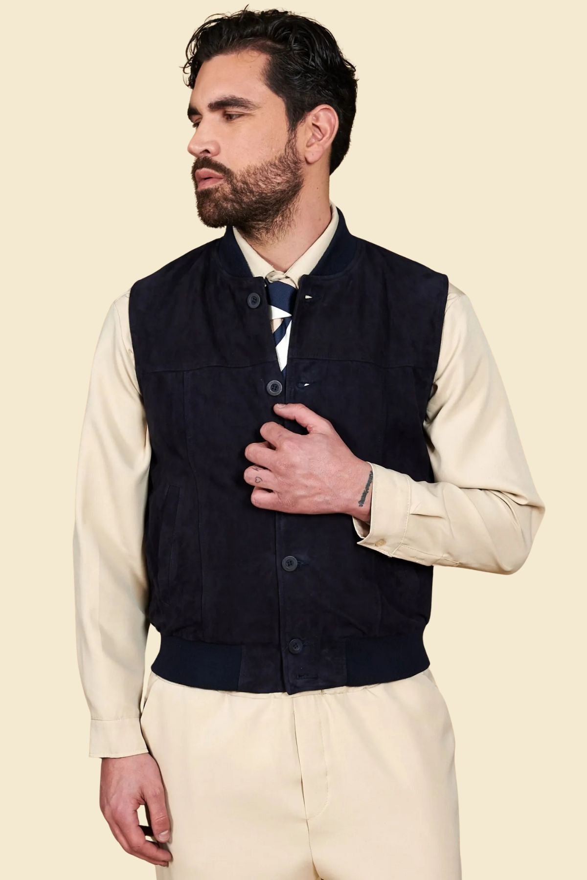 men’s classic-fit Western vest in black suede with structured seams and clean silhouette.