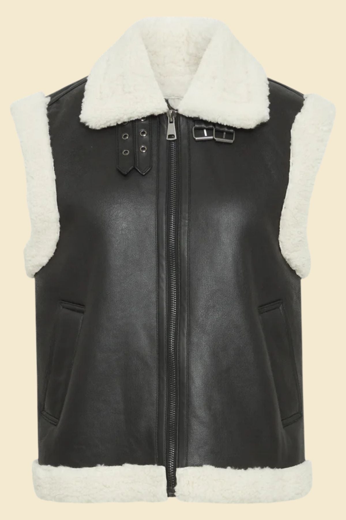 Sherpa-lined sheepskin vest in neutral tones for classic women’s outerwear.