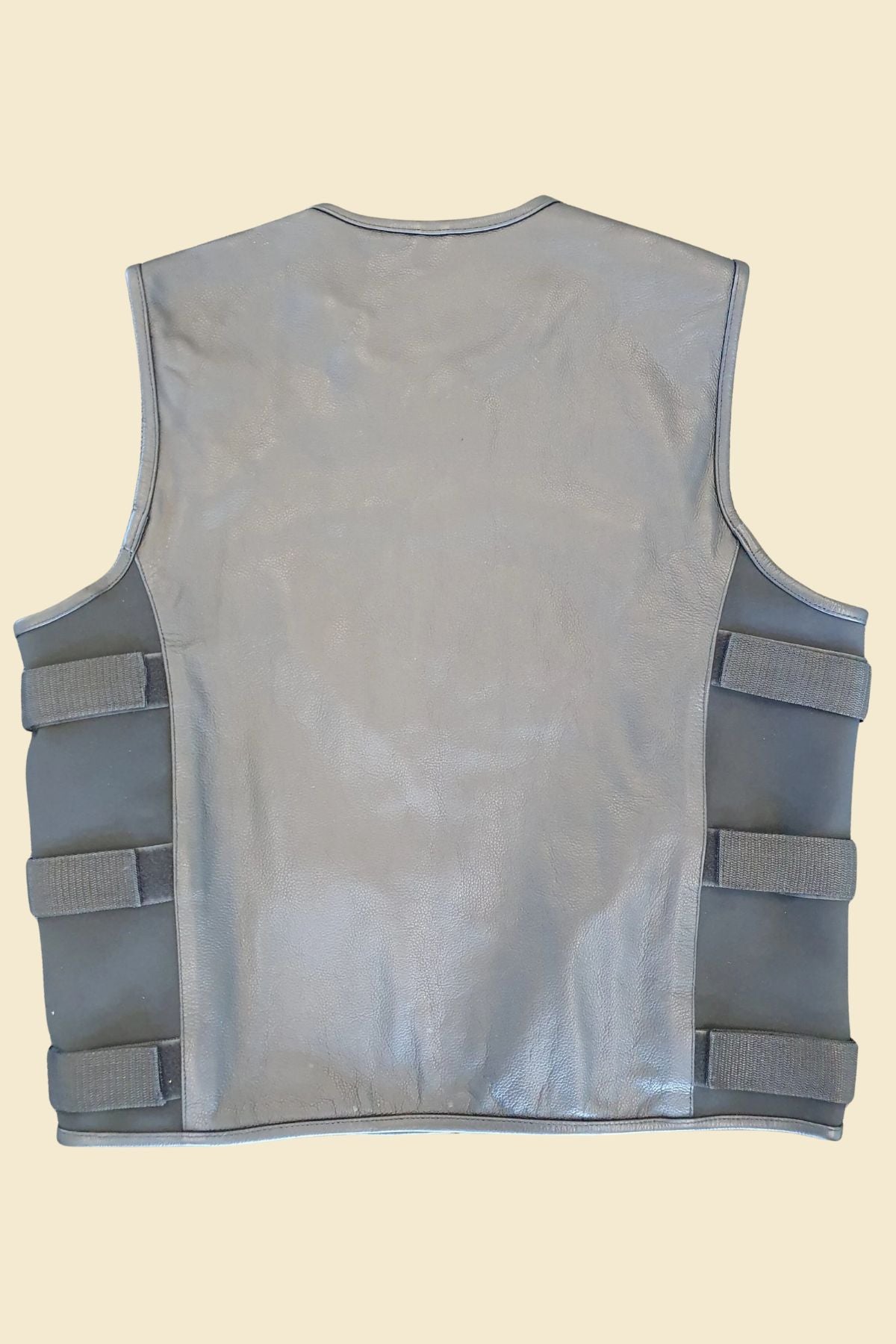 Modern biker vest in gray leather styled for rugged, everyday use.