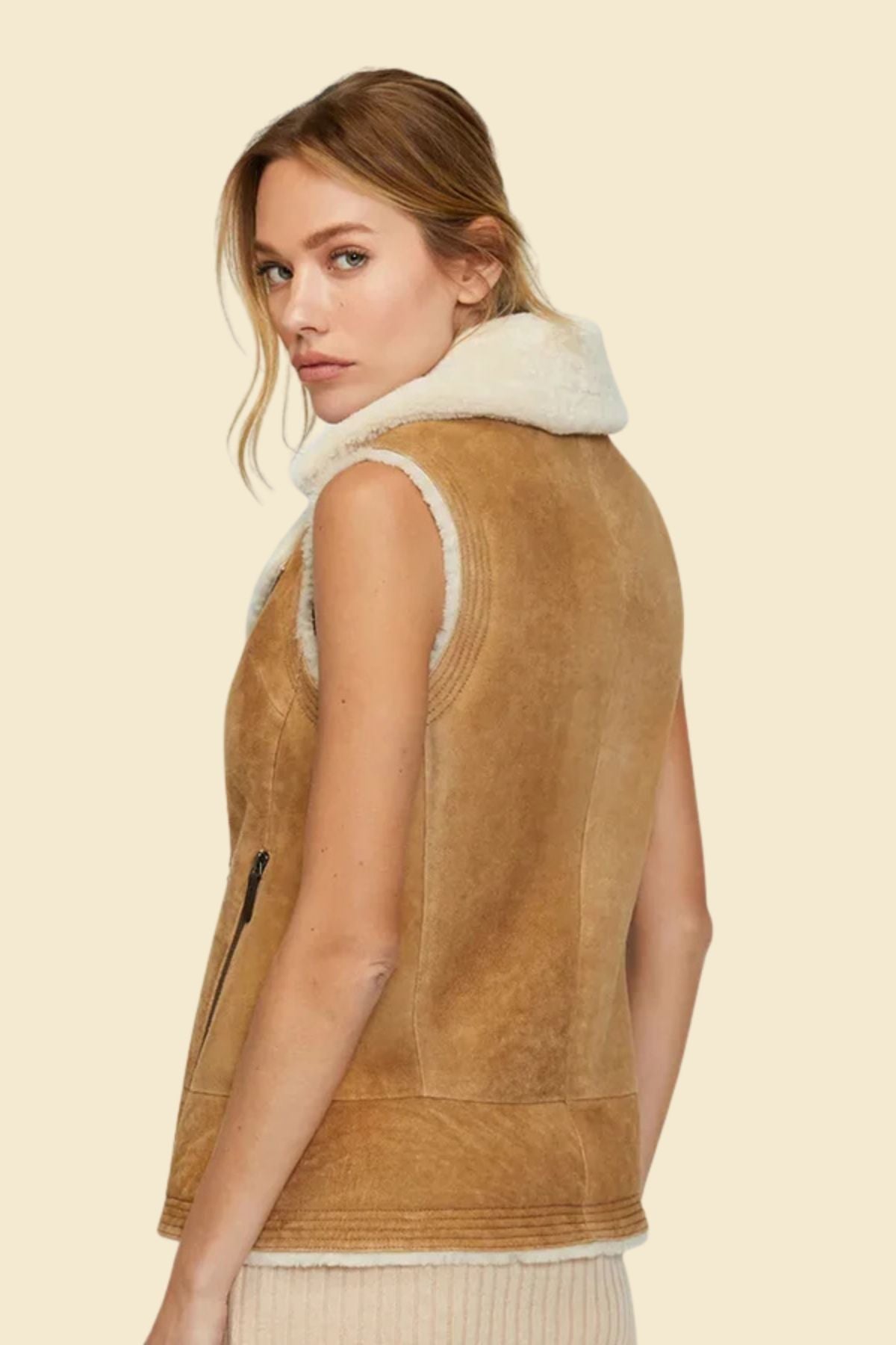 Sherpa-lined leather vest for women in timeless aviator design.