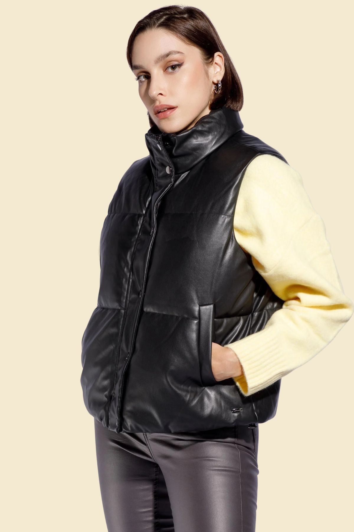 Stylish black puffer vest for women made from premium sheepskin leather.
