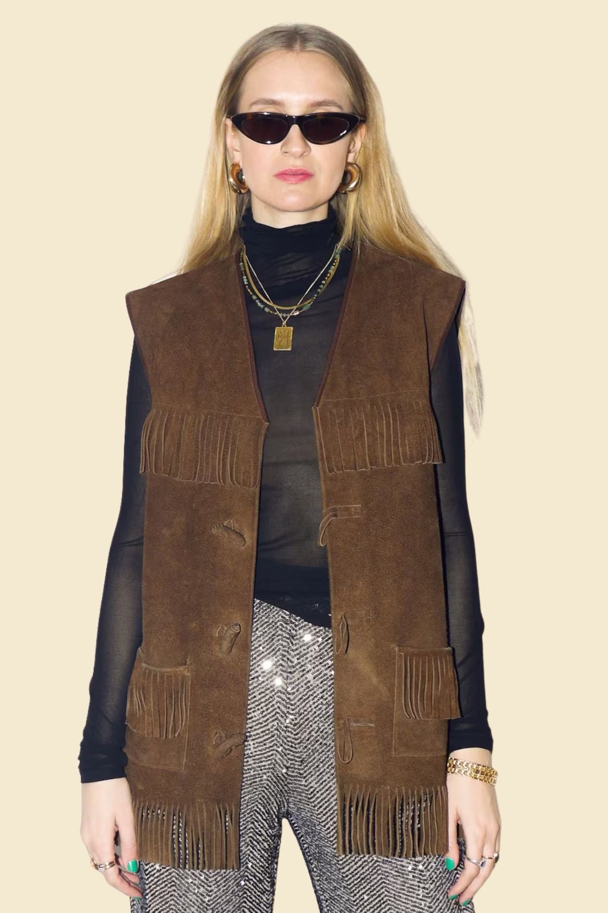 brown fringe suede vest styled with denim.