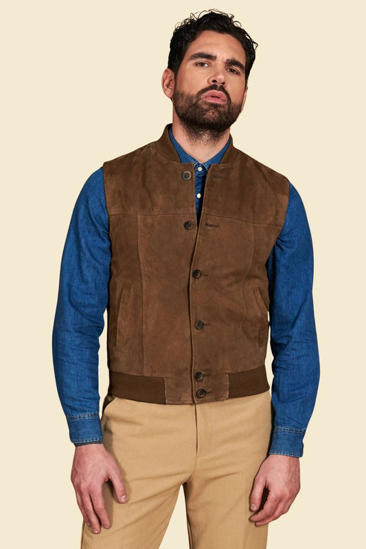 brown suede bomber vest styled with jeans and sneakers for a relaxed streetwear look.