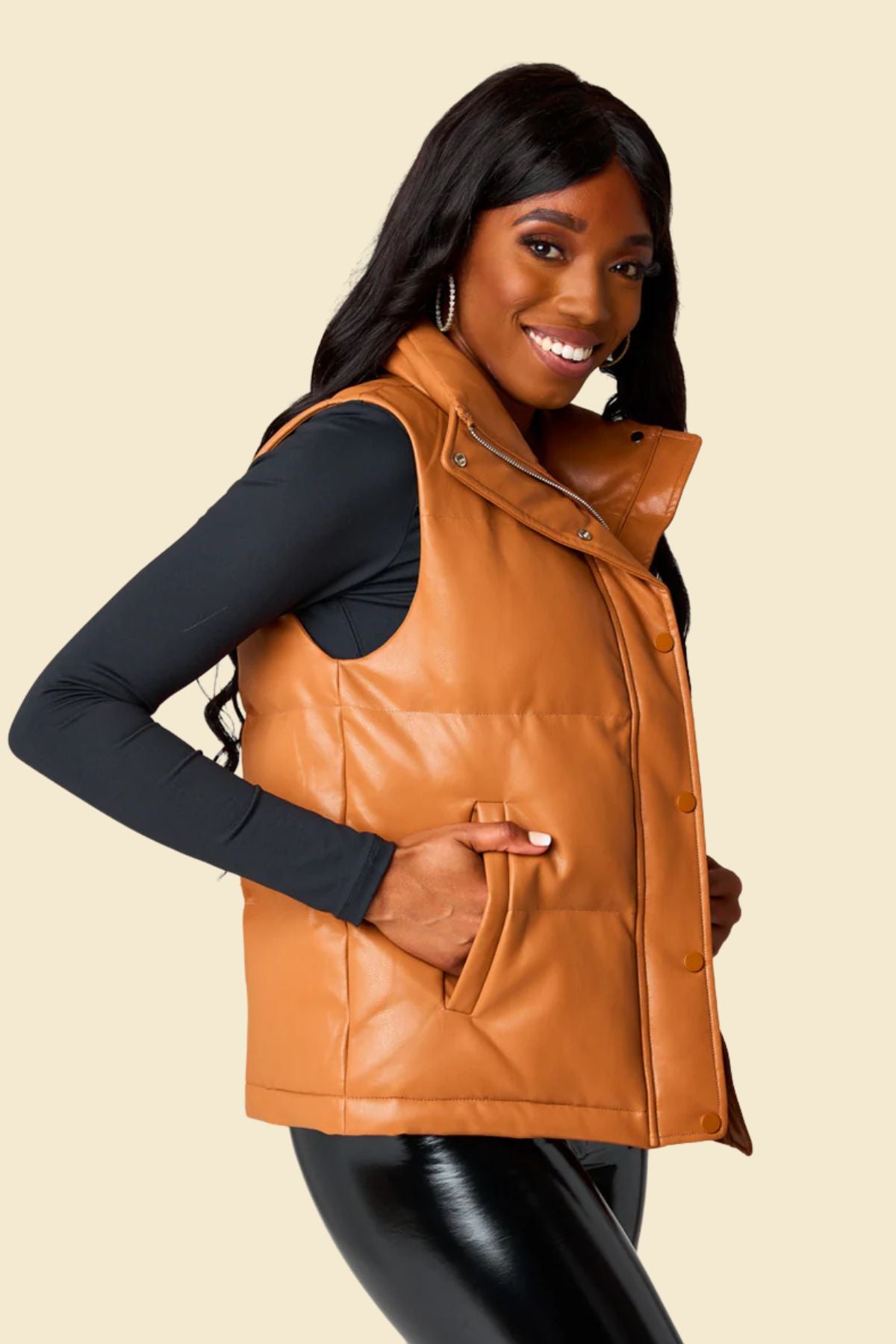 Brown puffer vest for women made from real sheepskin leather.