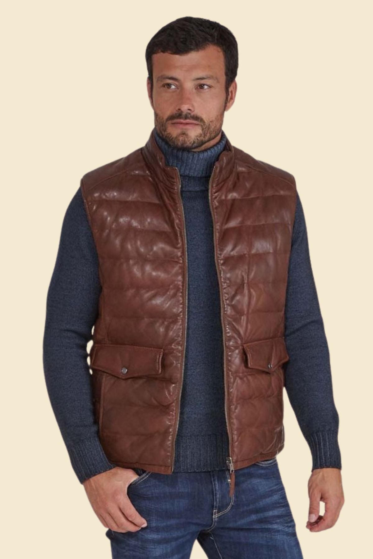 Men’s brown sheepskin leather puffer vest with quilted design and zip closure.