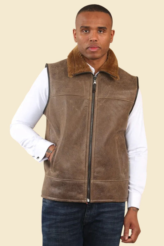 men’s brown leather vest made from sheepskin with soft faux fur lining, styled for a casual everyday look.