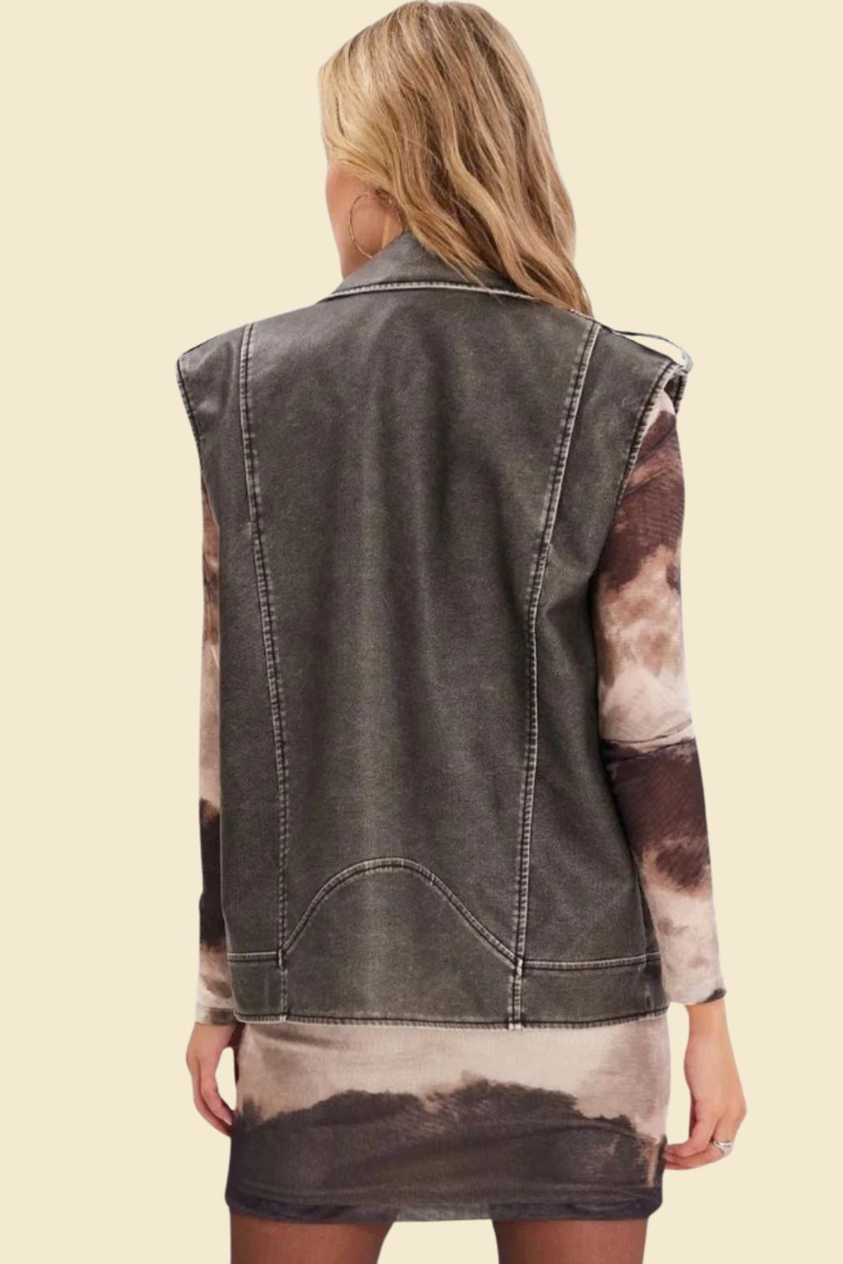 Genuine cowhide gray biker vest for women with polyester lining.