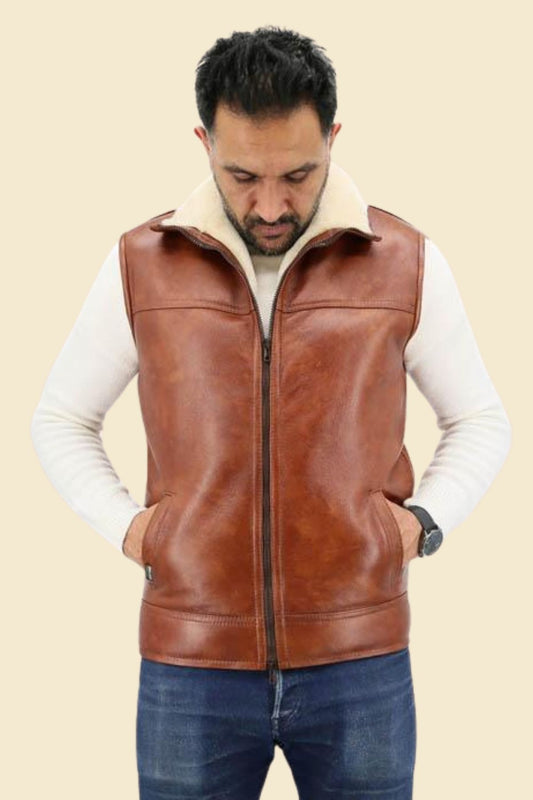 rich sheepskin leather texture and plush faux shearling lining on aviator vest.