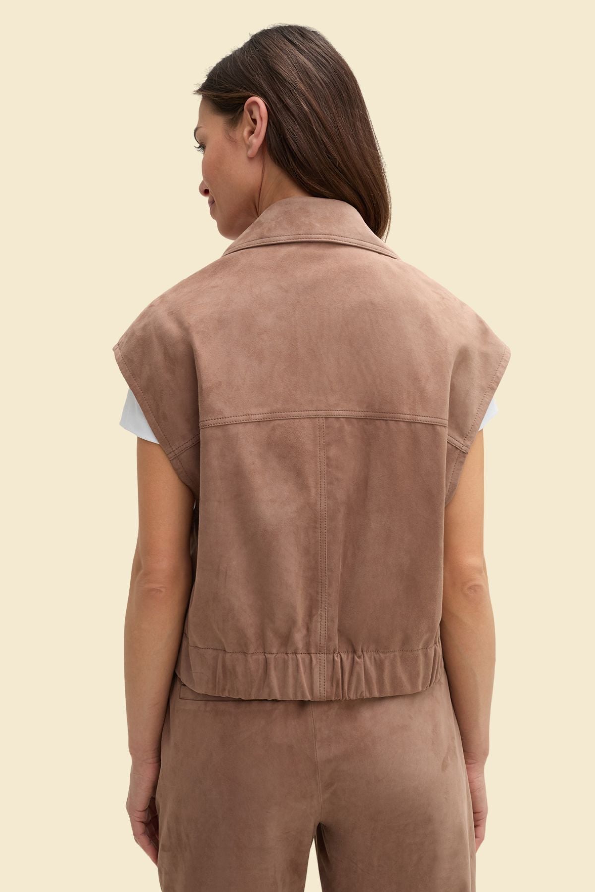  women’s brown suede biker vest with tailored fit.