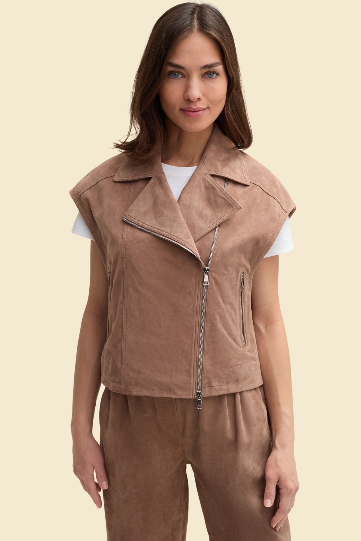 Women’s brown suede leather biker vest designed for riding.