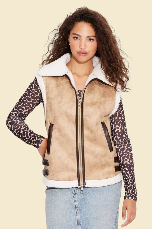 Women’s brown sheepskin leather aviator vest with faux fur lining.