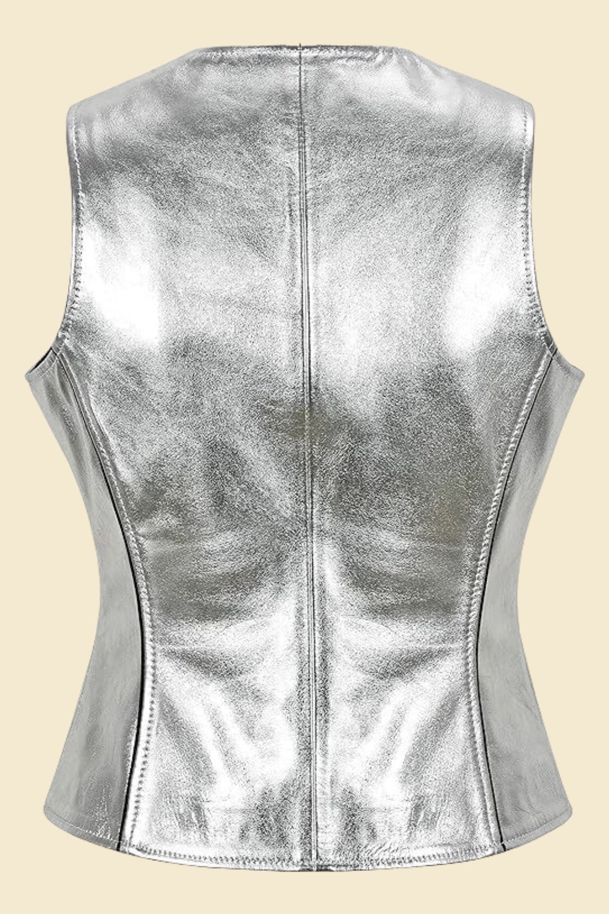 Shiny silver leather vest for women, perfect for layering with statement outfits.
