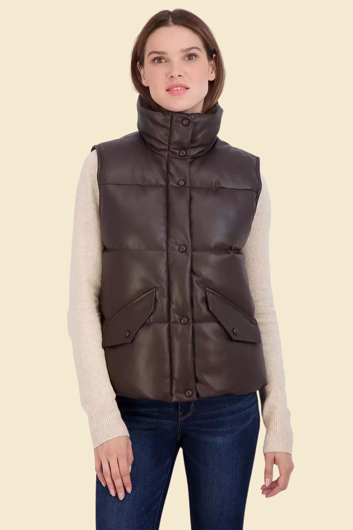 Women’s chocolate brown lambskin leather puffer vest with front zipper.