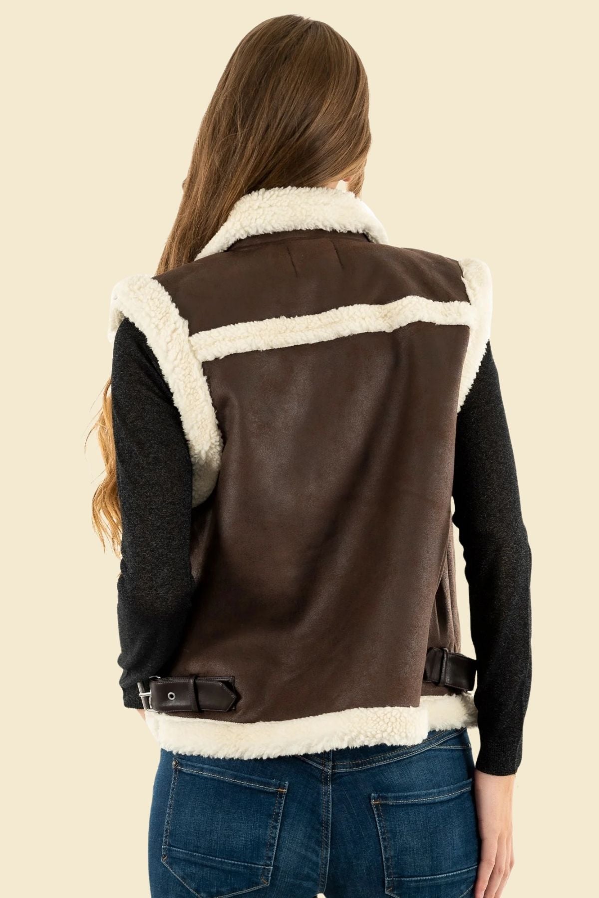 Women’s lambskin leather vest with soft sherpa lining in a classic casual cut.