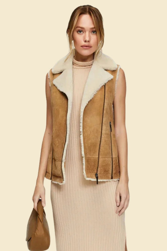 Women’s vintage aviator vest in brown leather with cozy sherpa lining.